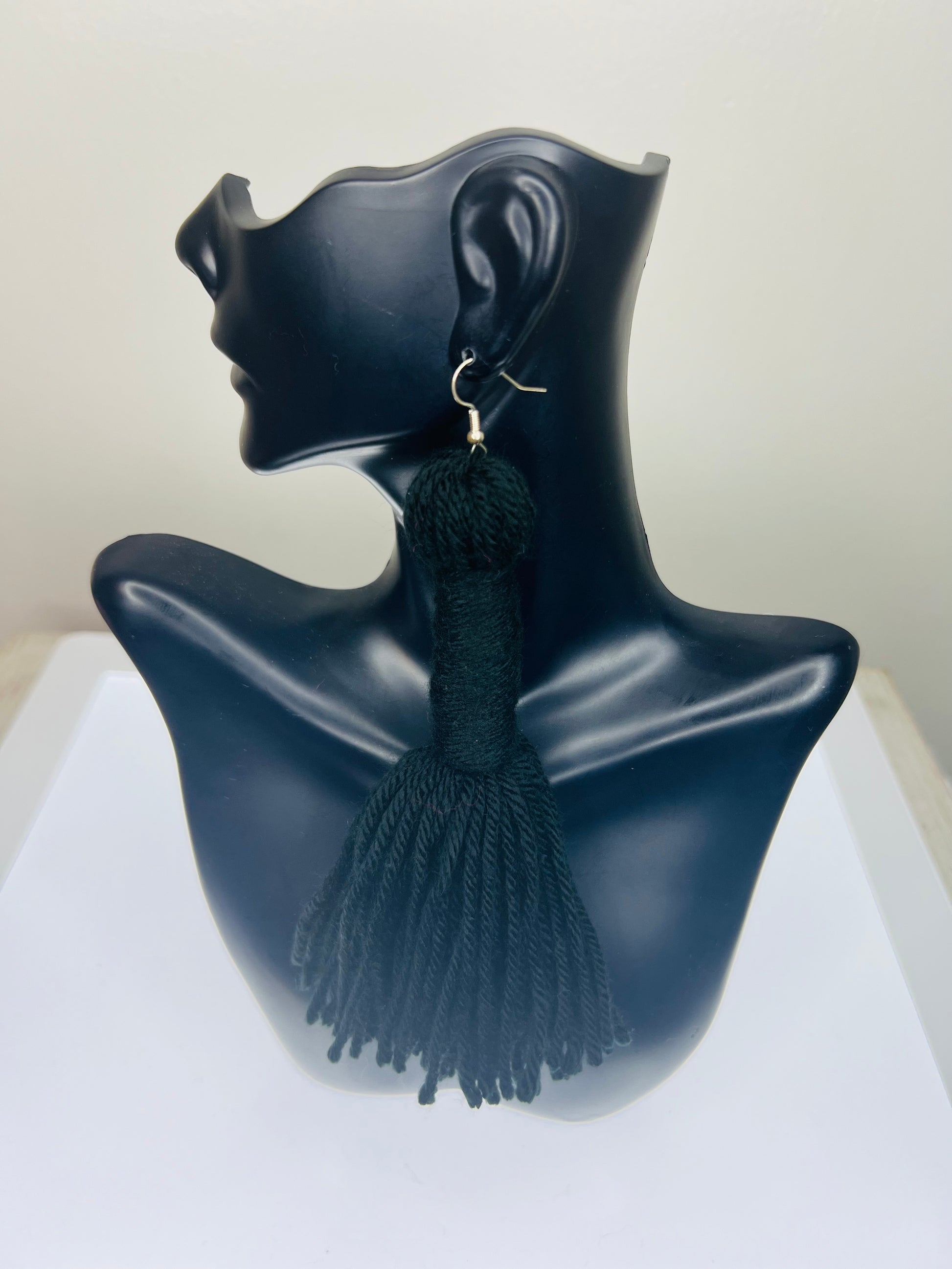 Long wrapped tassels